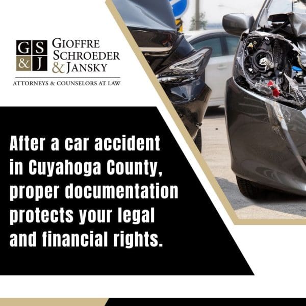 A close-up view of two vehicles with significant rear-end and front-end damage from a car accident.