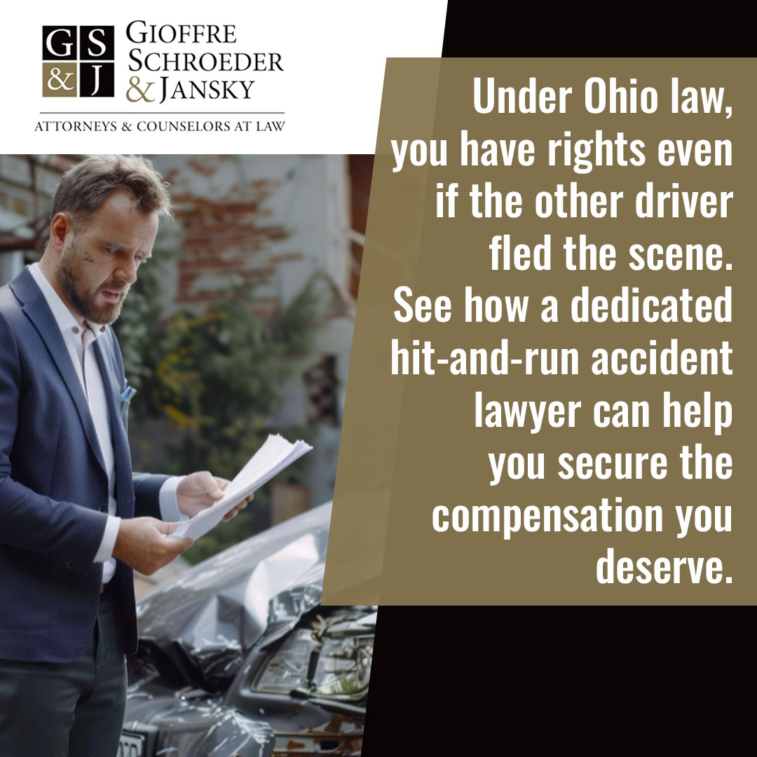 Car accident victim reviewing documents after hit-and-run incident with help from Ohio personal injury lawyer