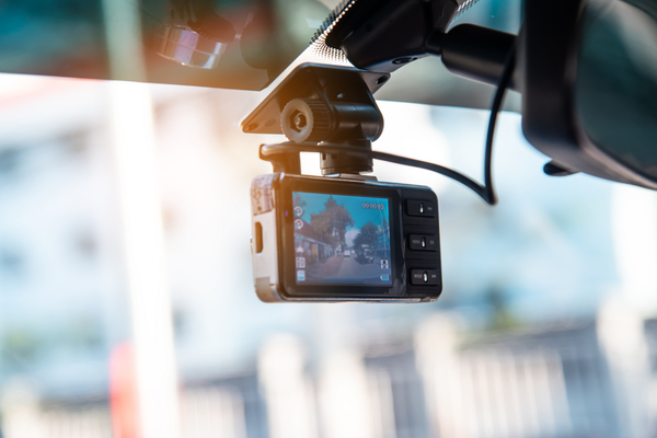 Dashcam on car window.