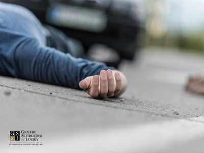 Person laying on street after a hit and run.